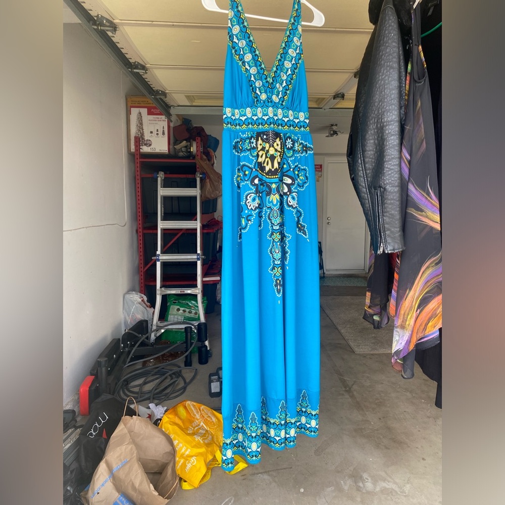 Long blue dress with designs. starting price 25 or best offer. l.